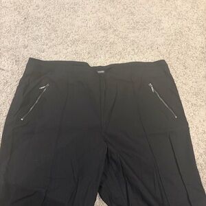 Women’s black dress pants with zipper pockets